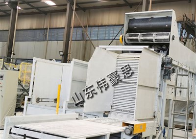 鈣粉垛料拆垛拆包機(jī)是怎樣完成拆垛拆包任務(wù)的？